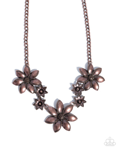 Necklace with floral designs on a white background