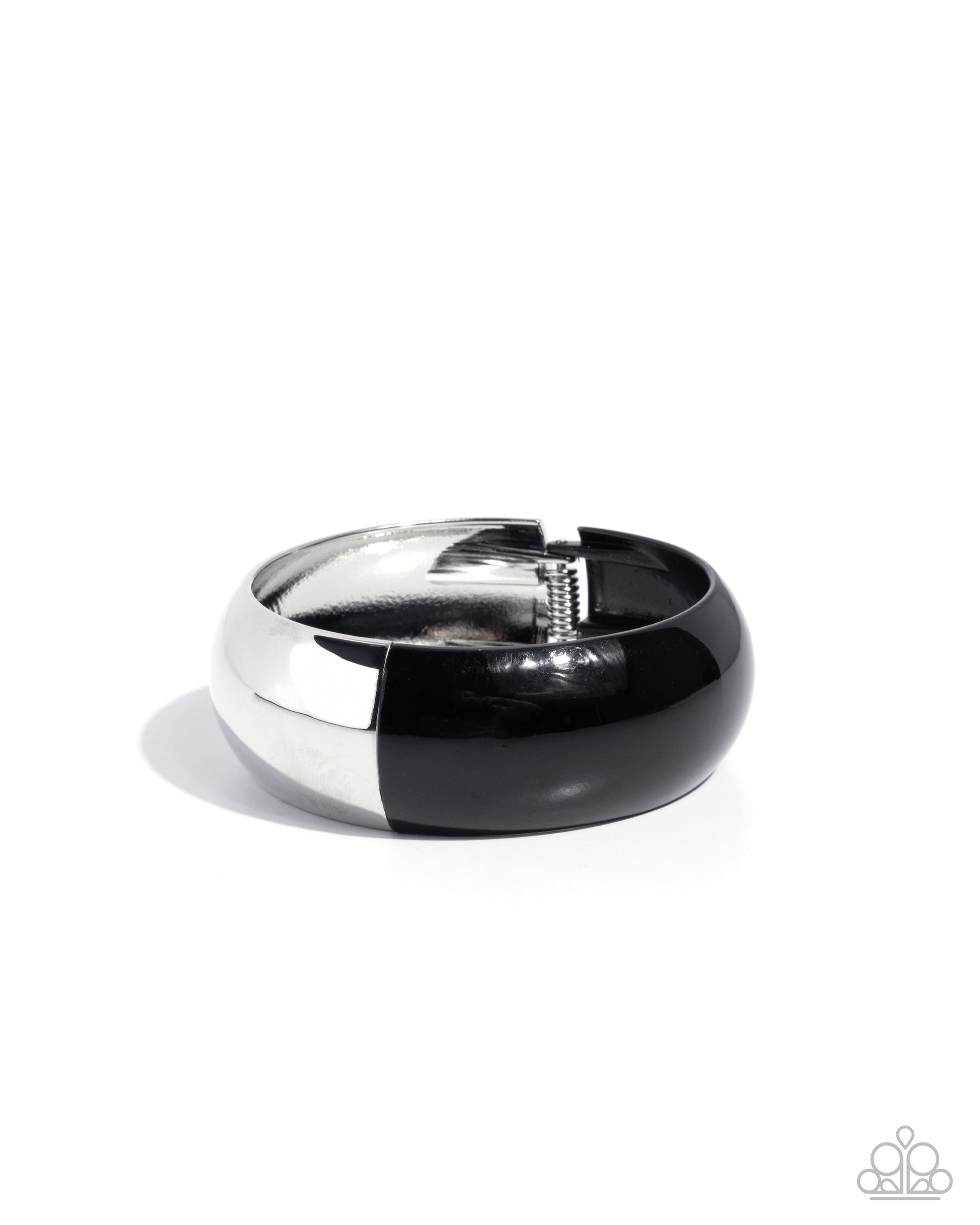 Black and silver ring on a white background