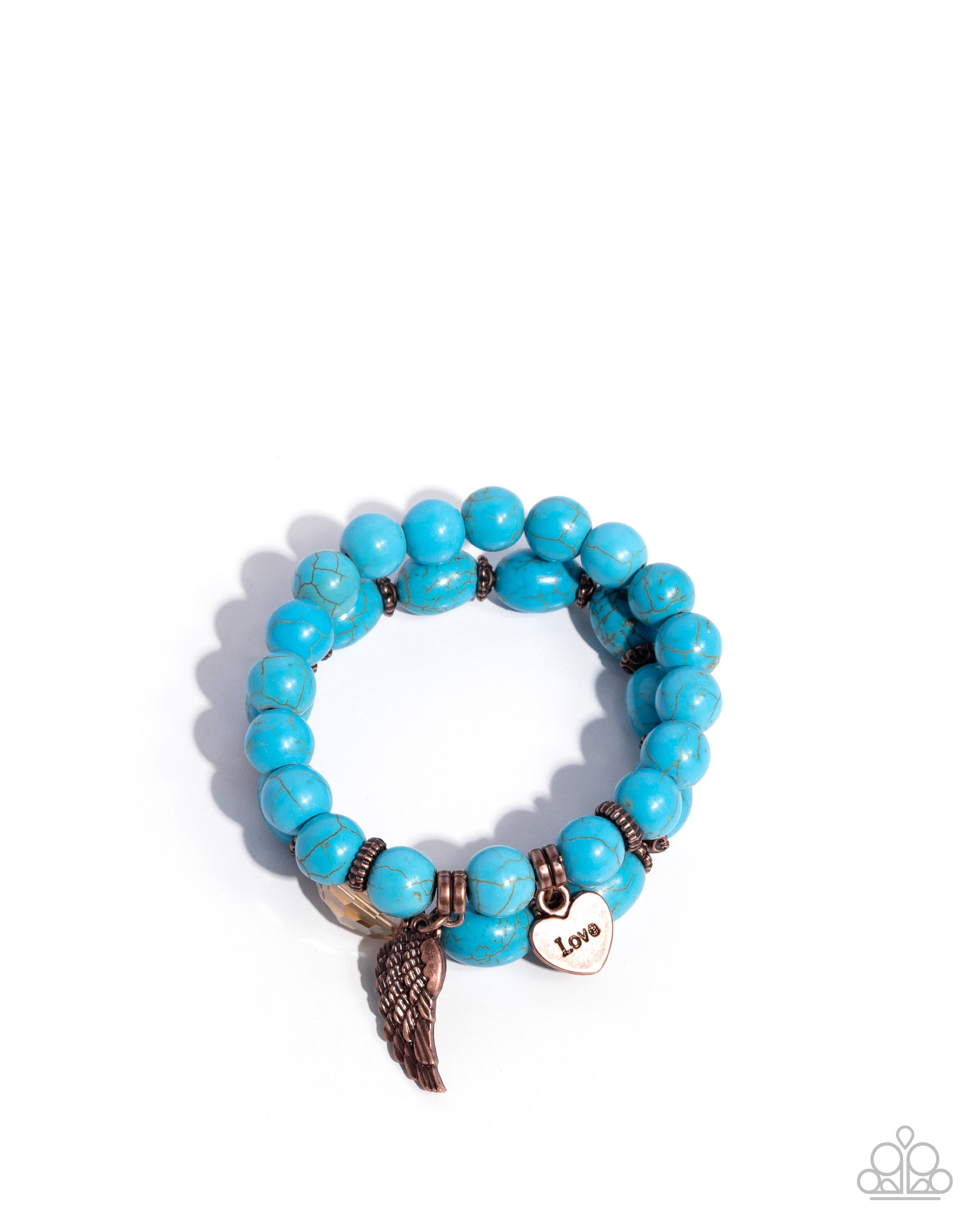 Turquoise beaded bracelet with wing and heart charm on a white background