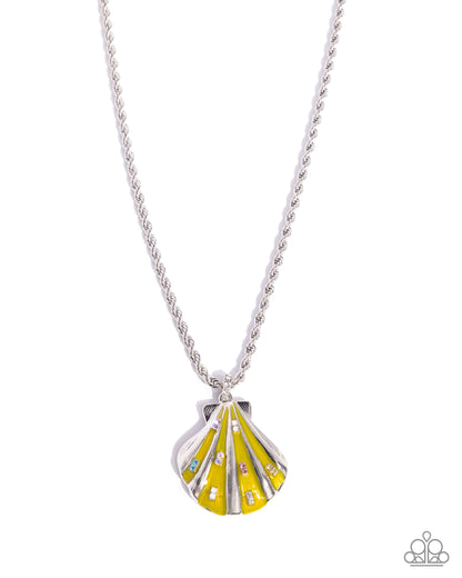 Yellow shell pendant necklace on a white background