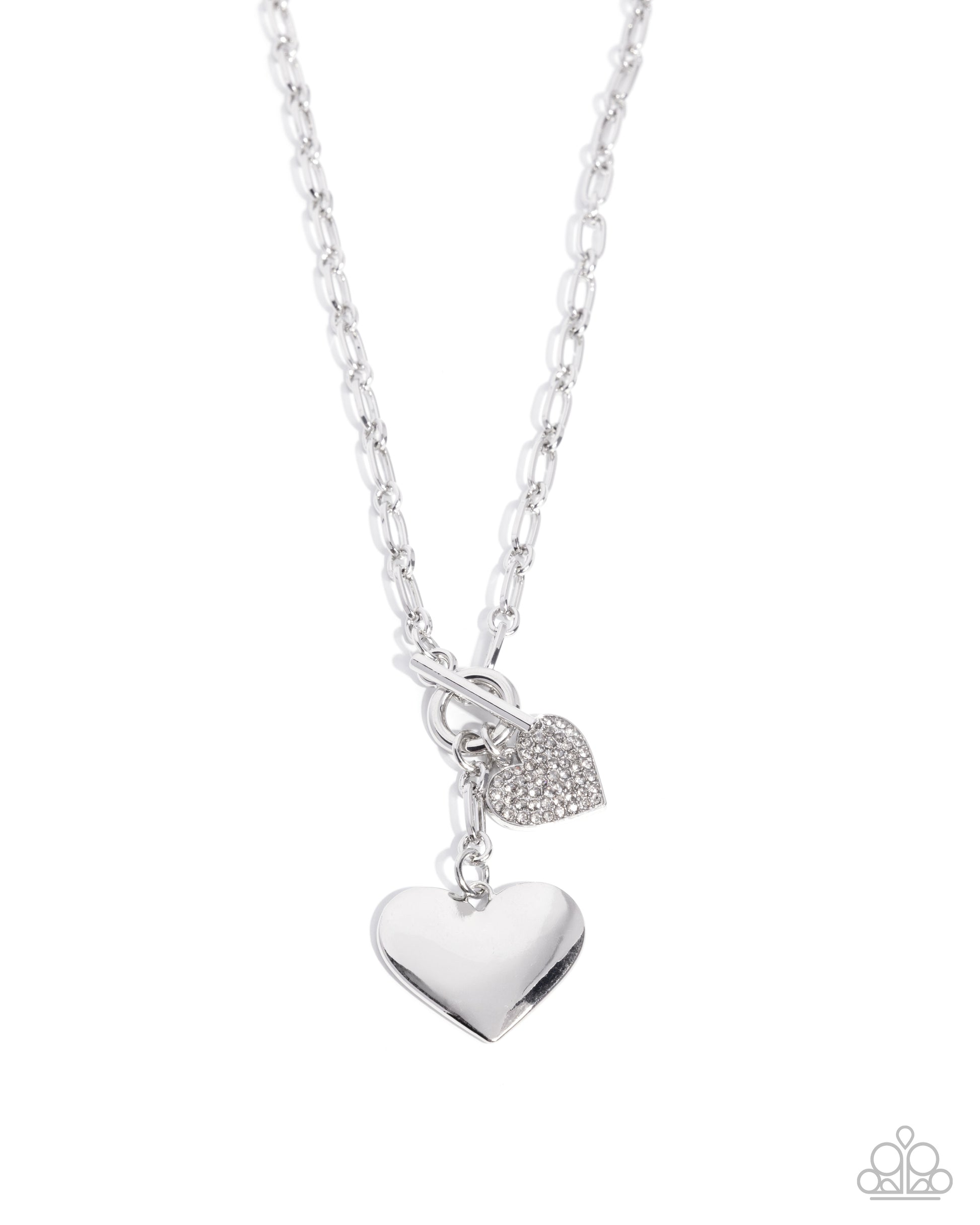 Silver heart-shaped pendant necklace on a white background