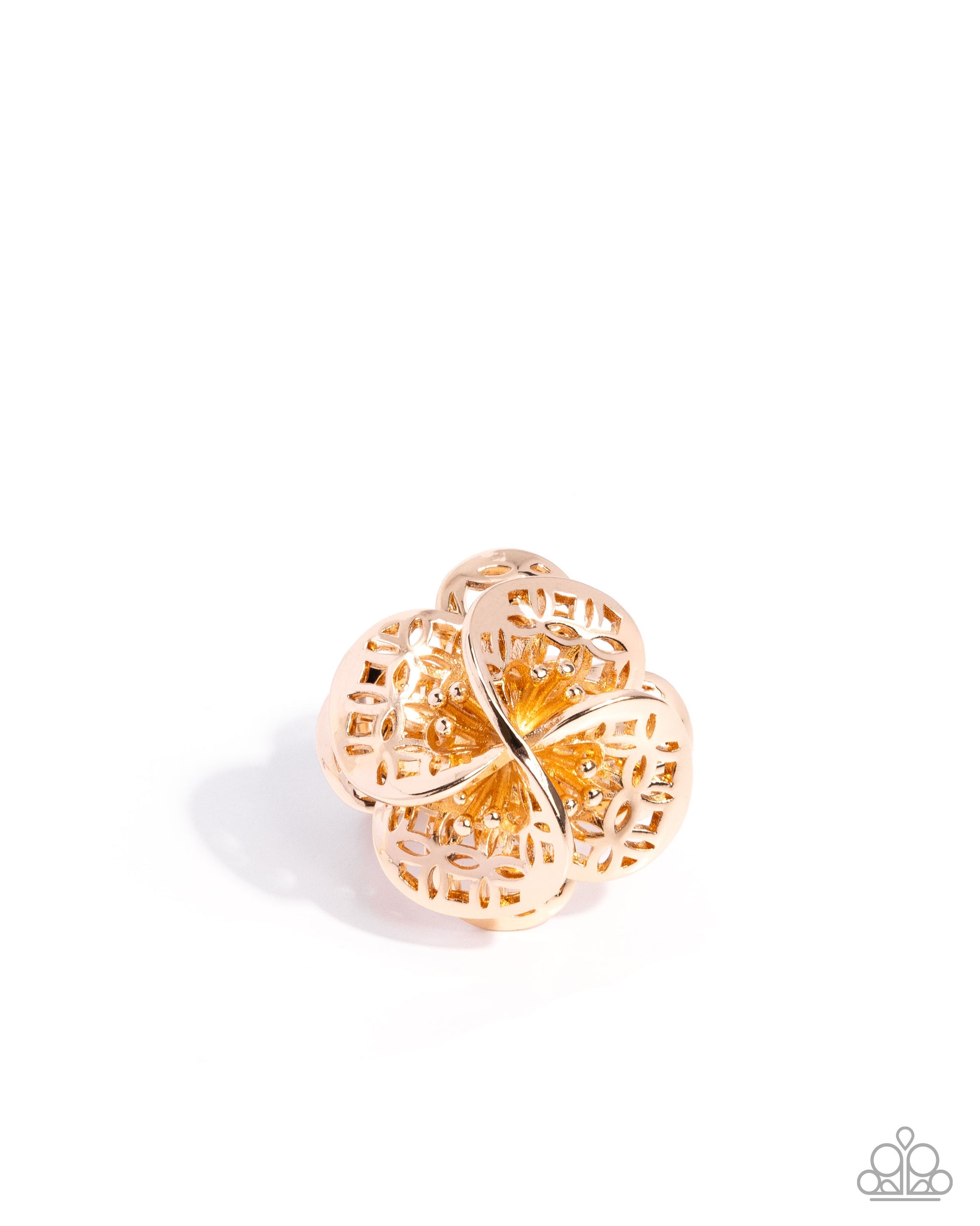 Gold ring with intricate design on a white background