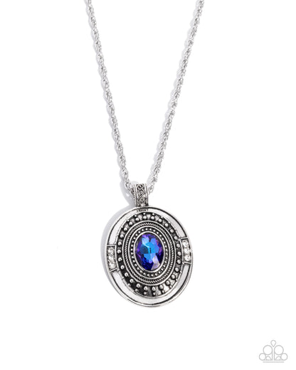 Silver necklace with a round pendant featuring a blue gemstone on a white background