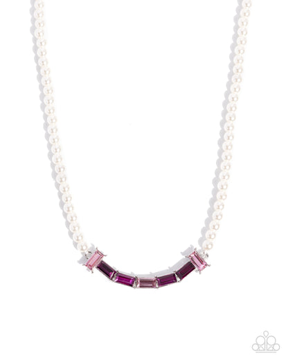 Necklace with pink and purple gemstones on a white background