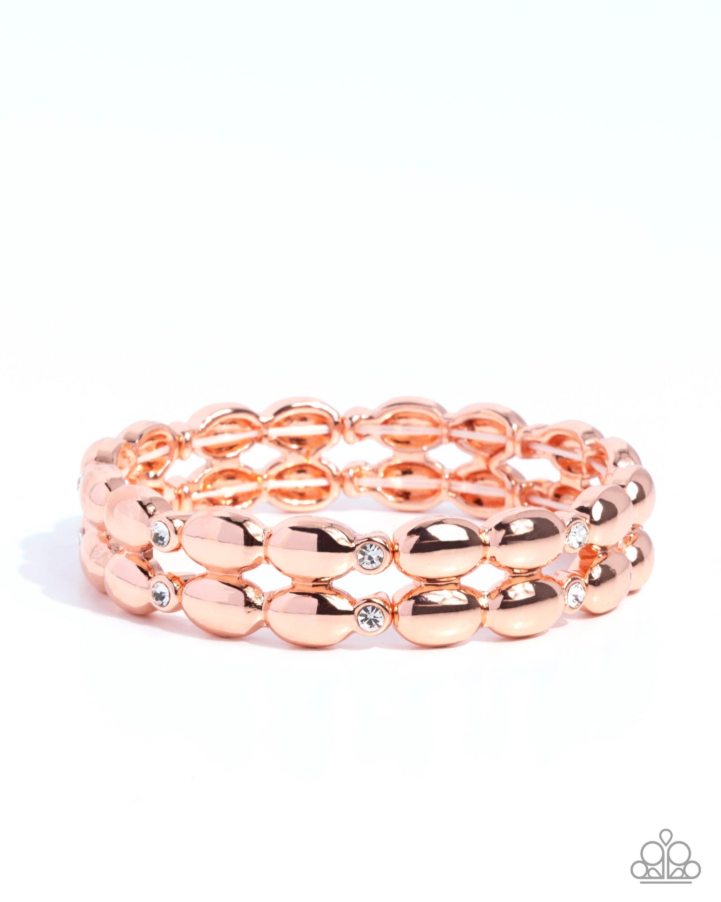 Rose gold beaded bracelet with a clear gemstone on a white background