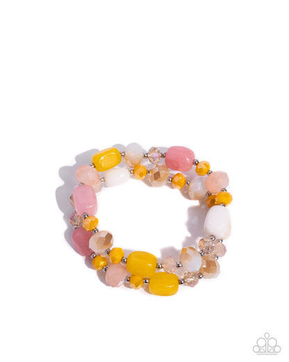 Multicolored beaded bracelet on a white background