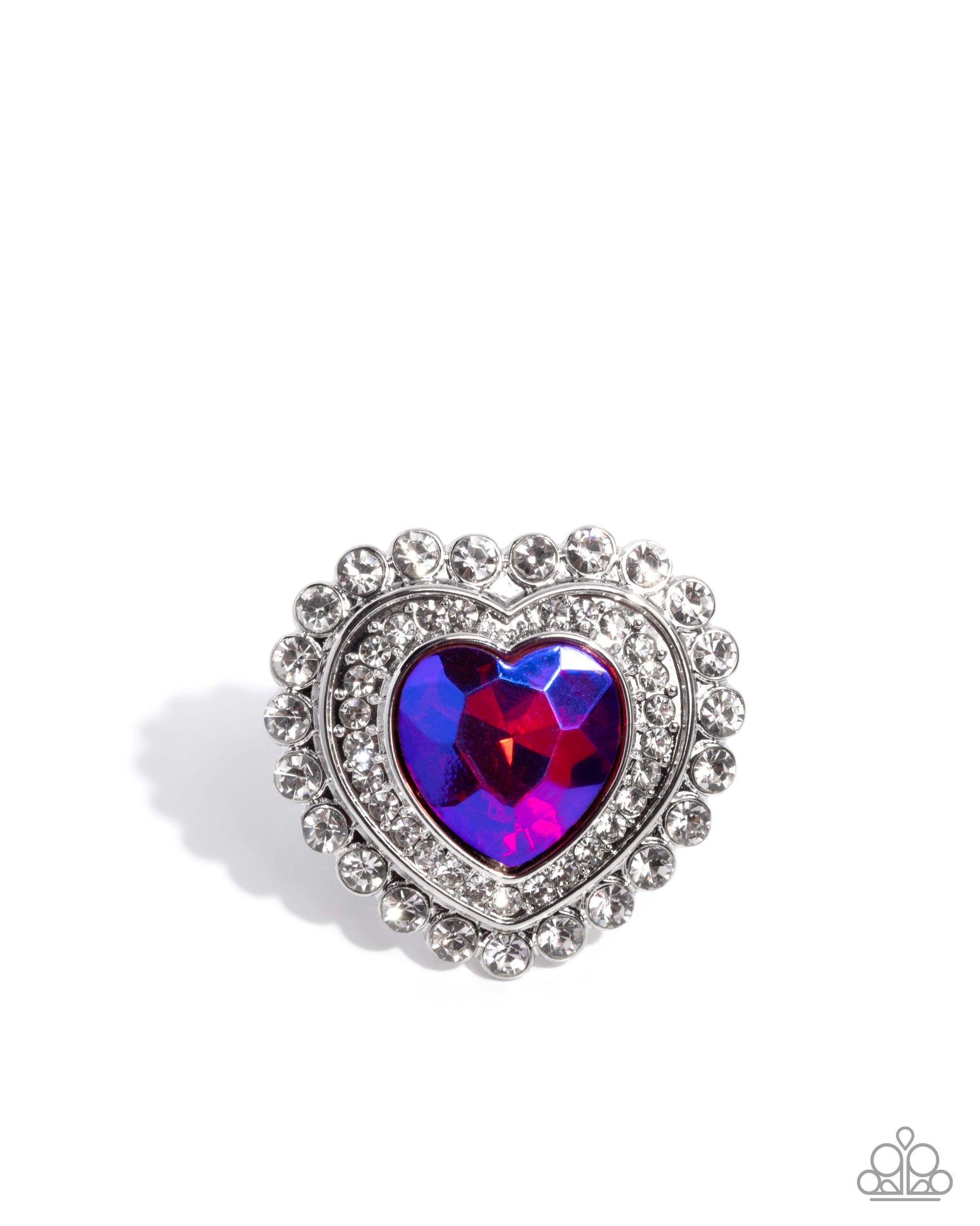 Heart-shaped brooch with colorful gemstone and decorative border on a white background