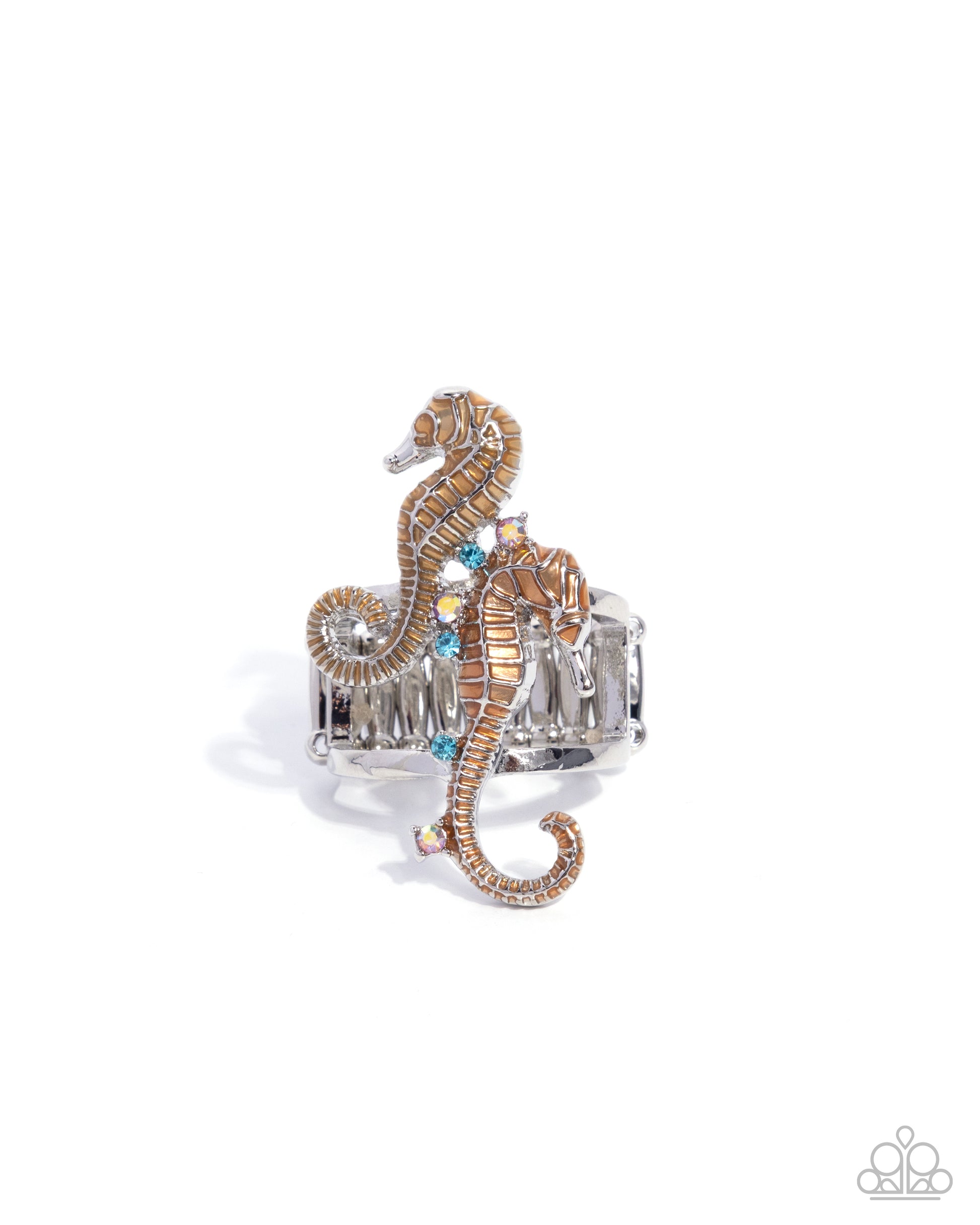 Silver ring with a seahorse design on a white background