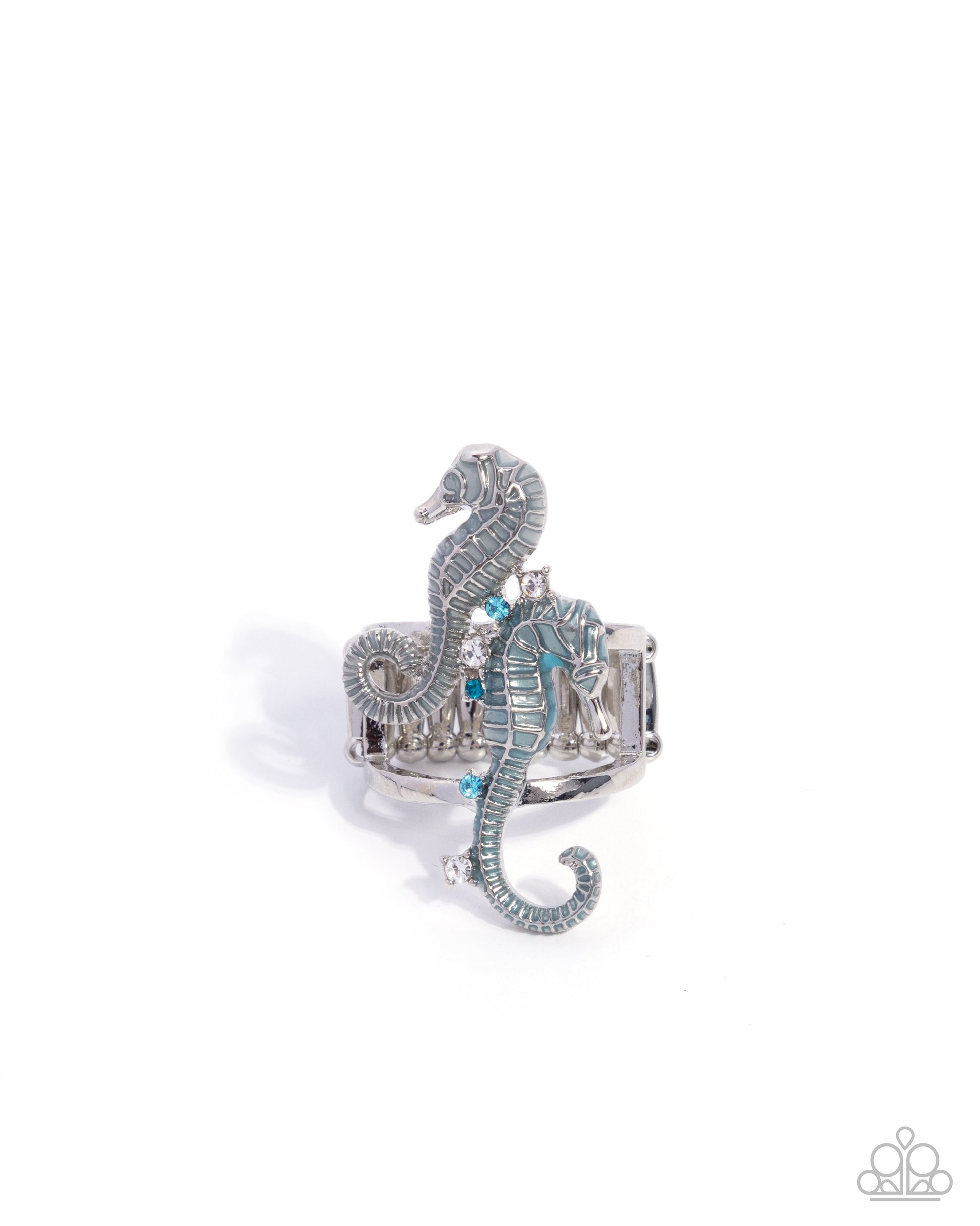 Silver seahorse-shaped ring with blue accents on a white background