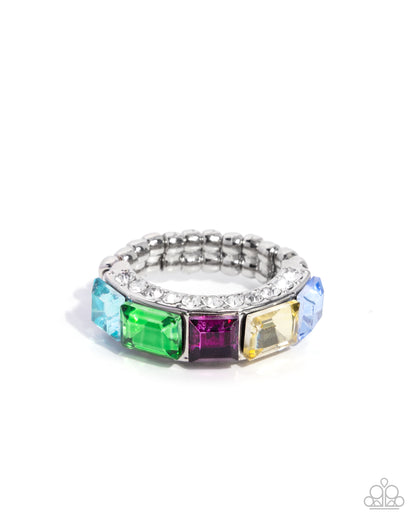 Multicolored gemstone ring on a white background