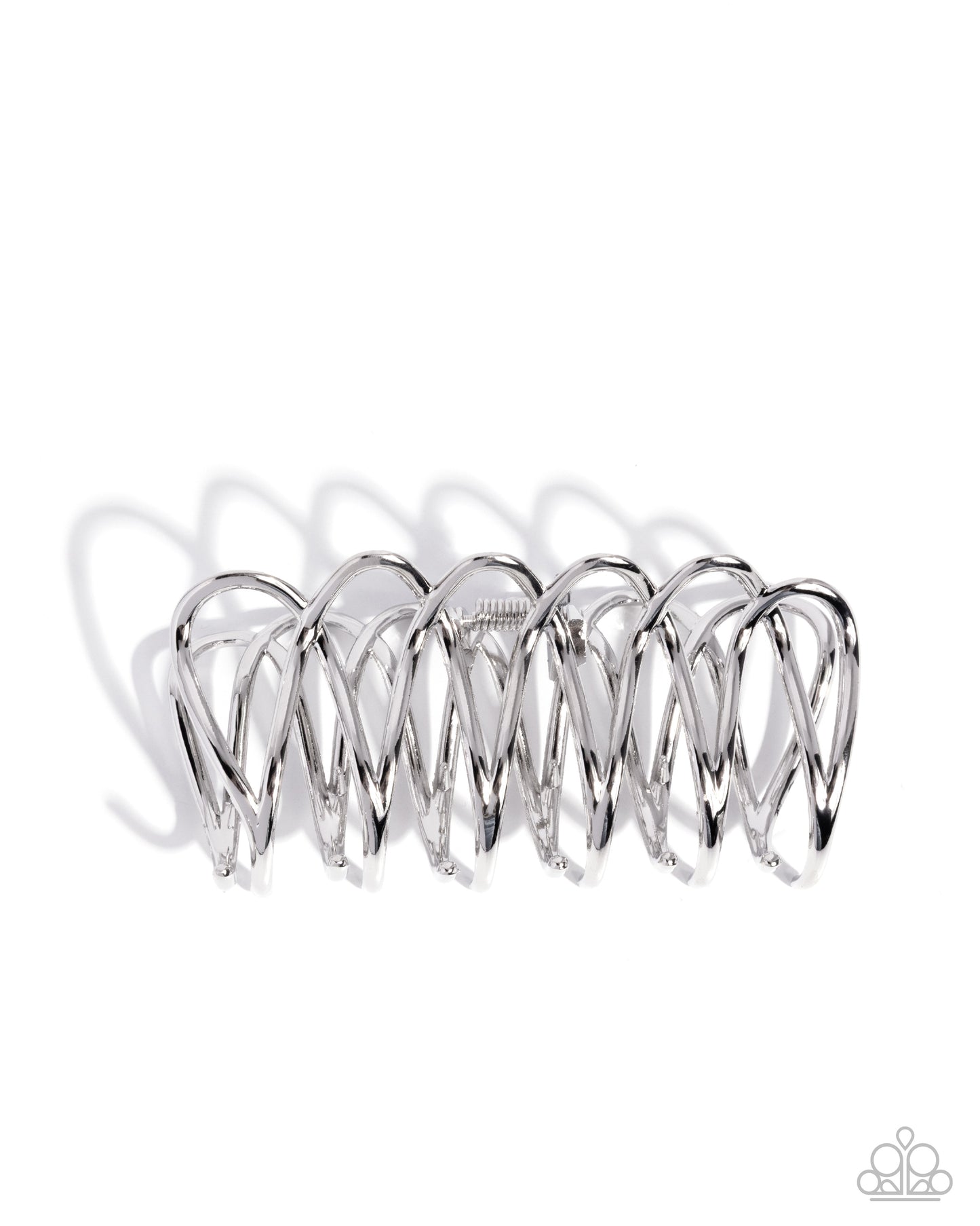 Silver hair crimping tool on a white background