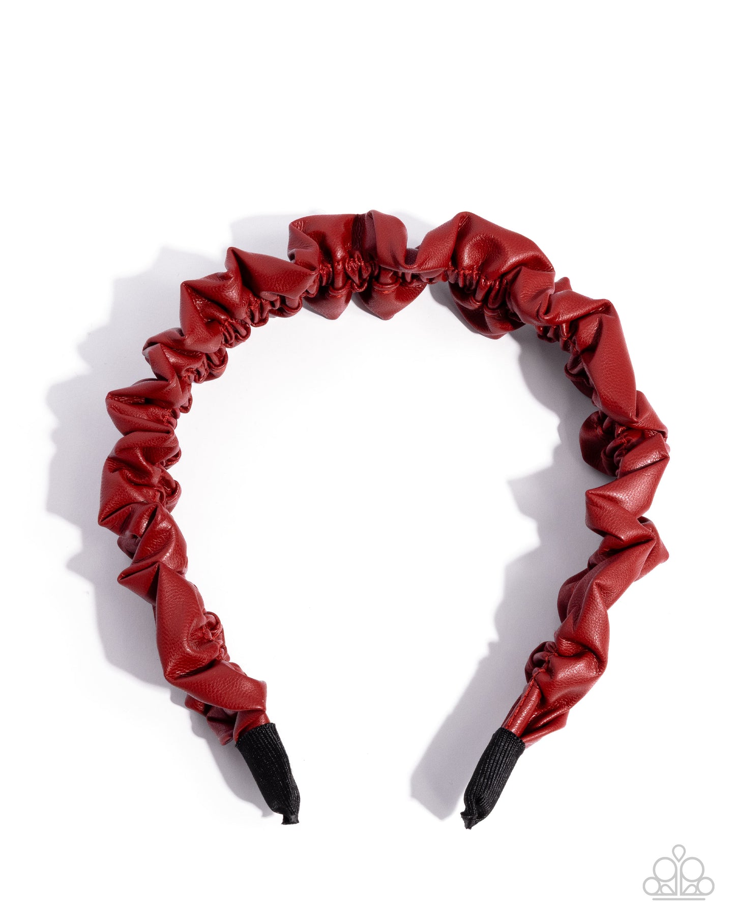 Red headband with black accents on a white background