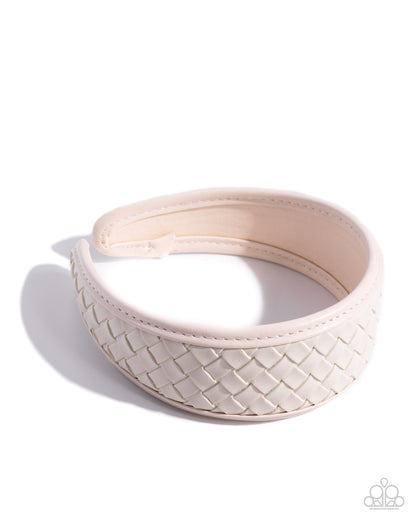 White woven headband on a white background