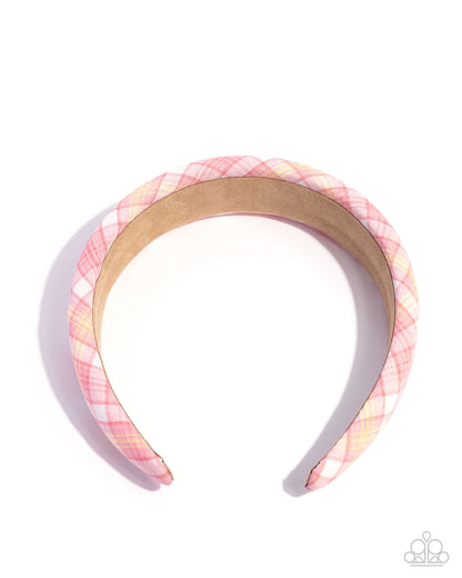Pink and gold plaid headband on a white background