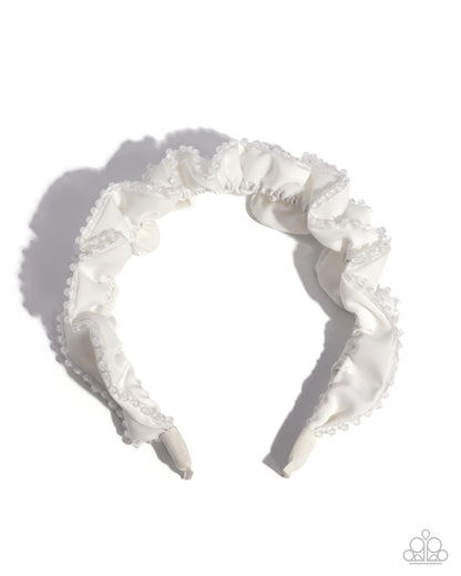 White lace headband on a white background