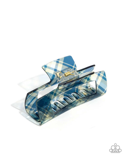 Blue and white plaid hair clip on a white background