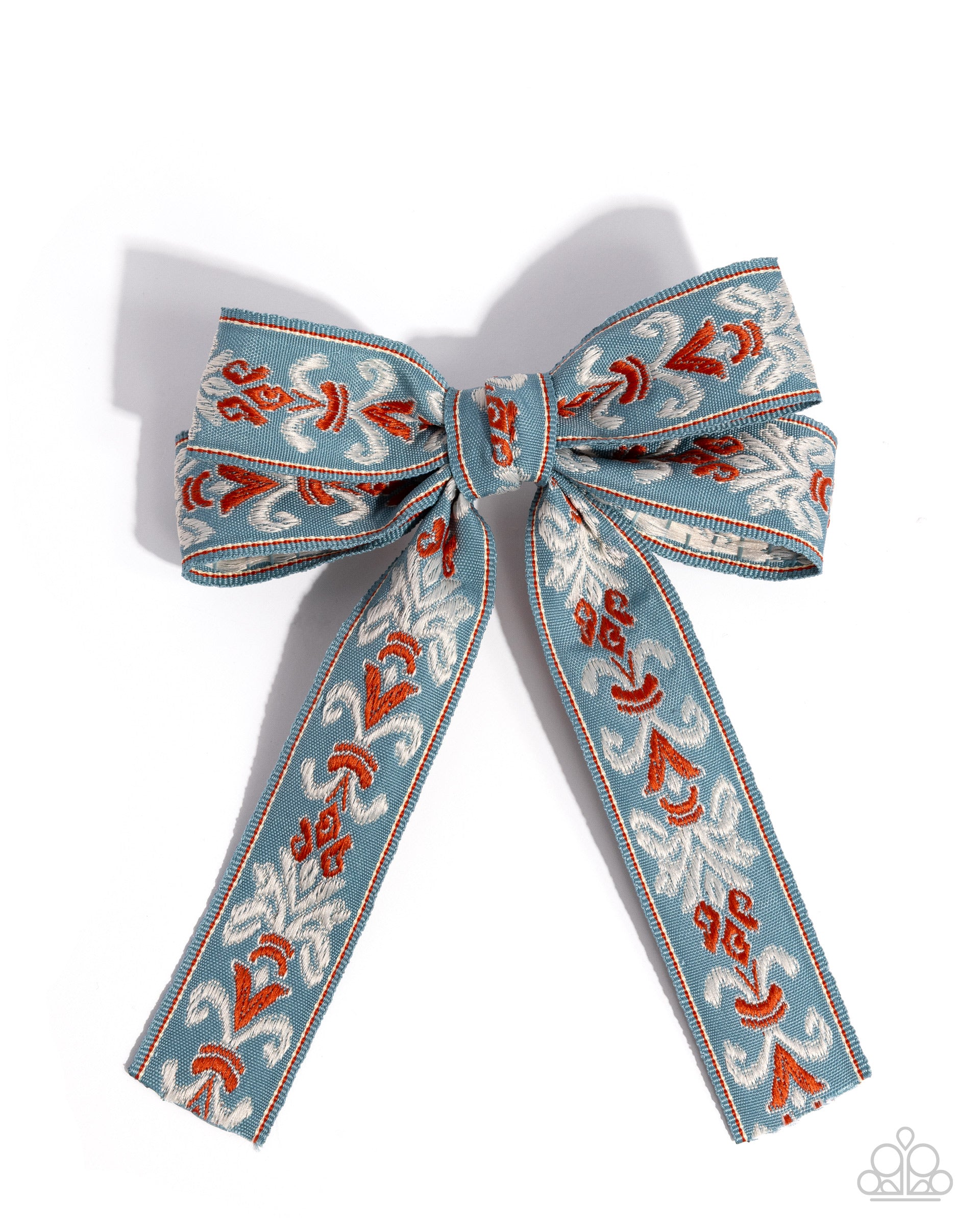 Decorative bow with blue, red, and white pattern on a white background