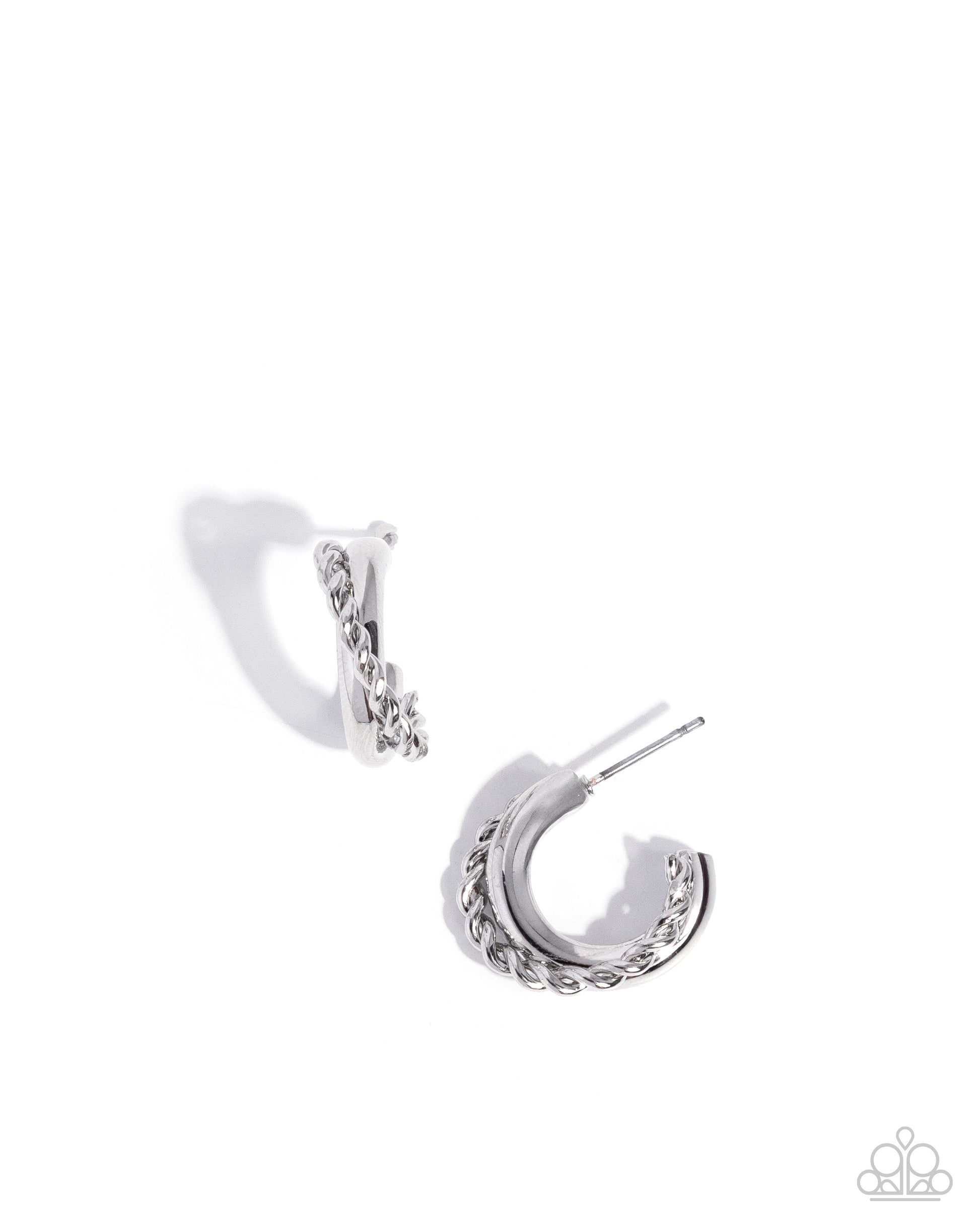 Silver hoop earrings on a white background