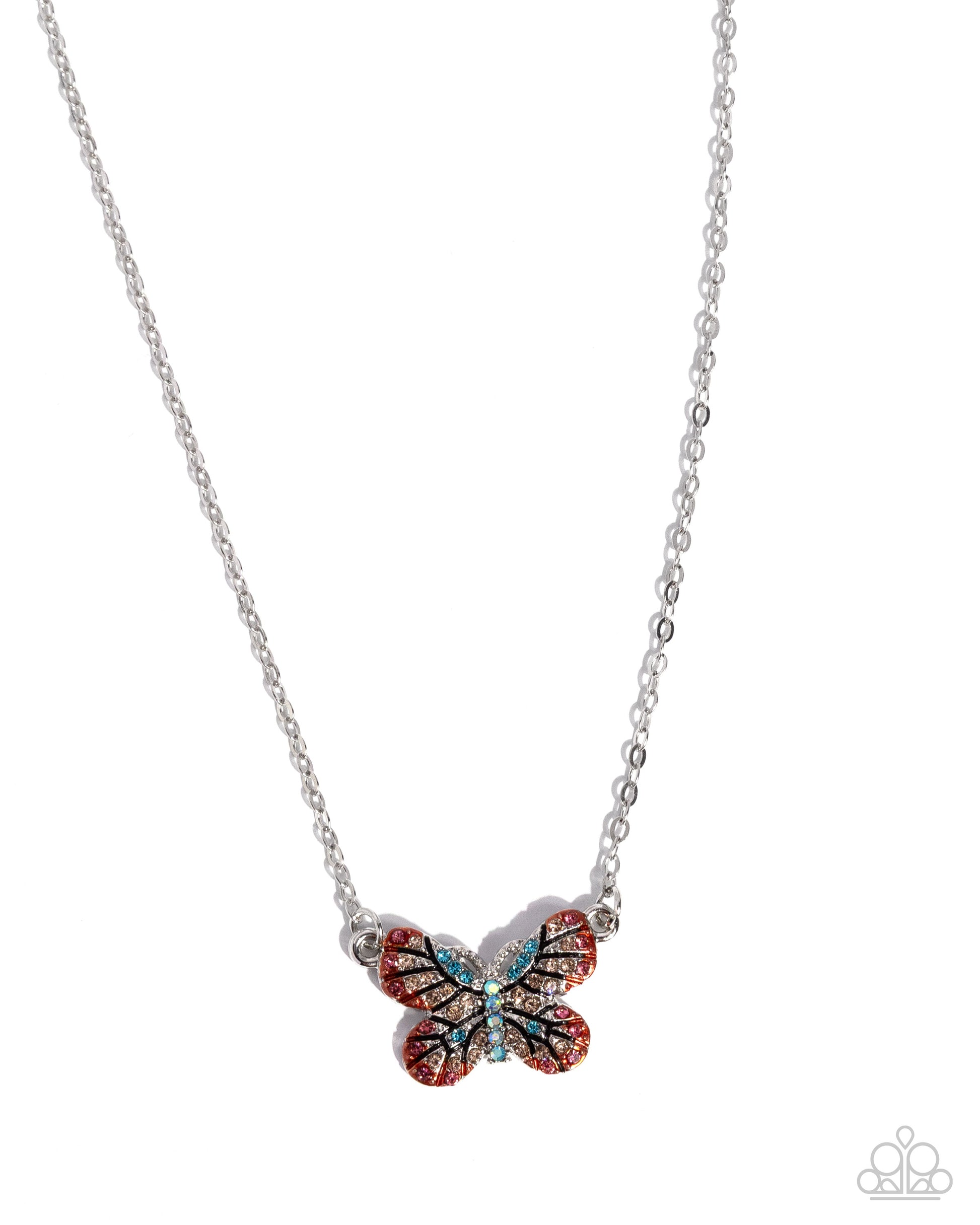 Butterfly-shaped pendant on a silver chain against a white background