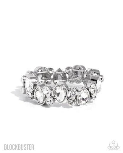 Silver bracelet with clear gemstones on a white background