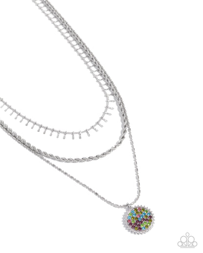Silver necklace with a multicolored pendant on a white background