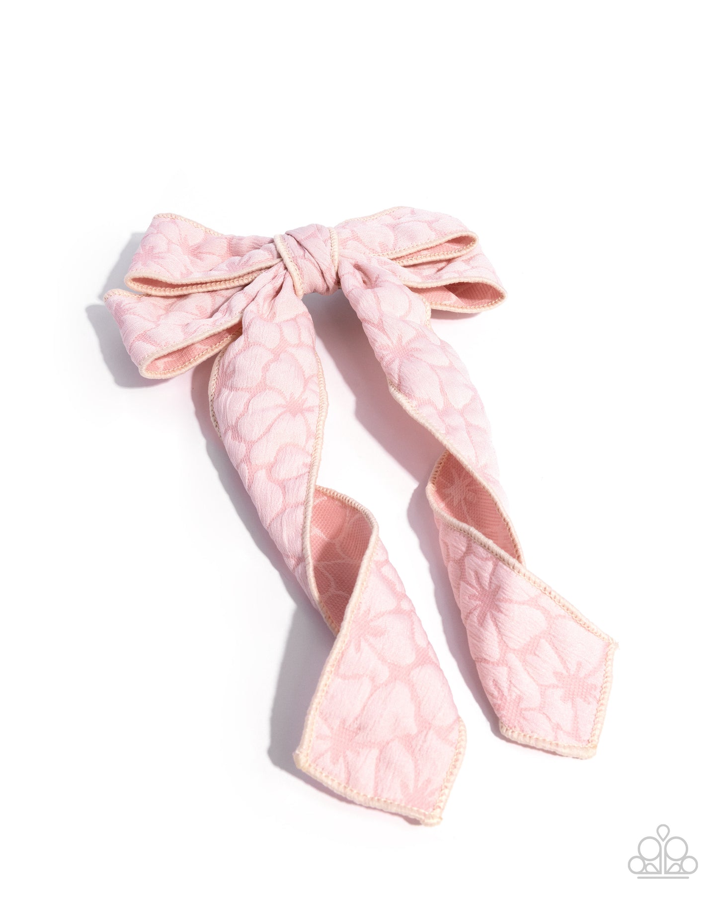 Pink hair bow on a white background