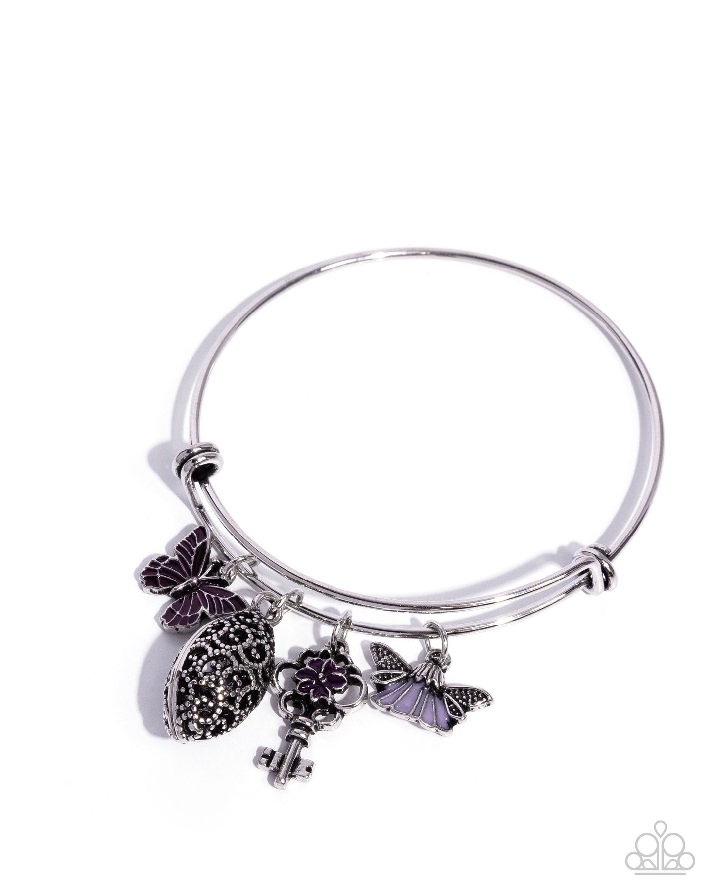 Silver bracelet with purple butterfly and key charms on a white background