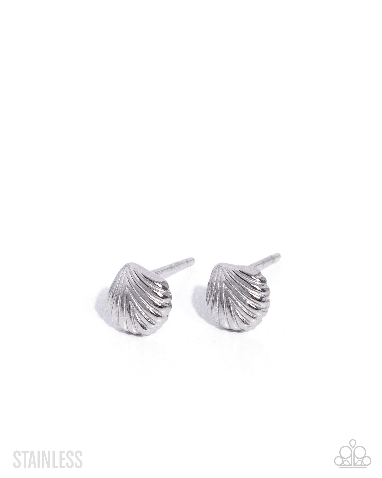 Pair of silver shell-shaped earrings on a white background