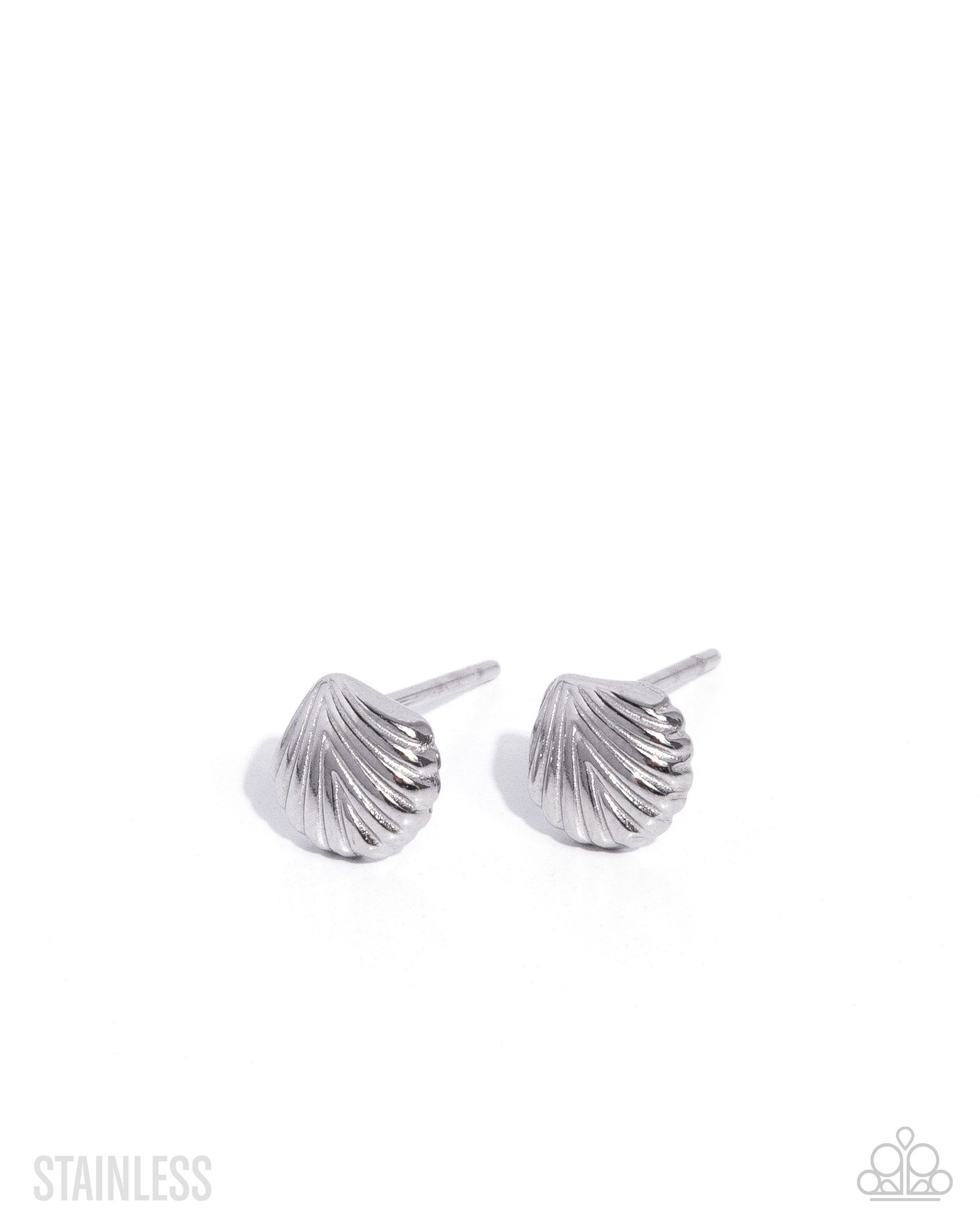 Pair of silver shell-shaped earrings on a white background