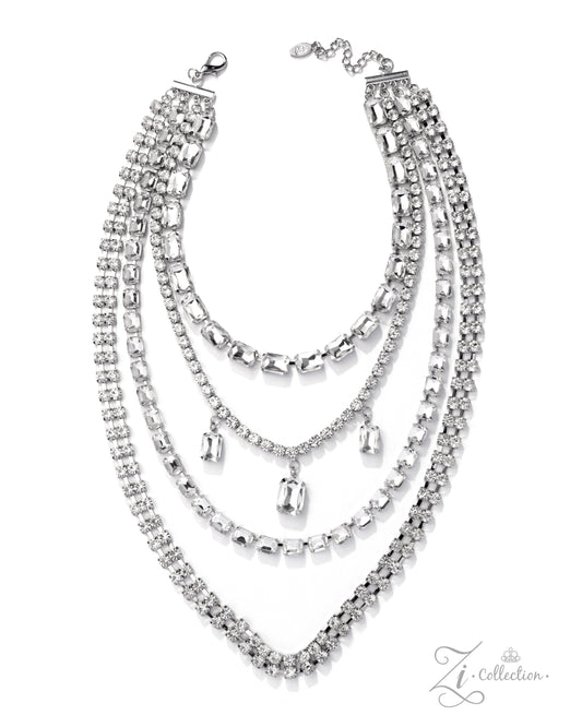 Set of three silver necklaces with clear stones on a white background