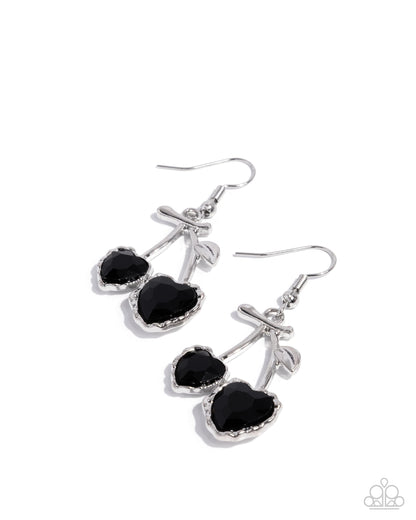 Pair of black heart-shaped earrings with silver crosses on a white background