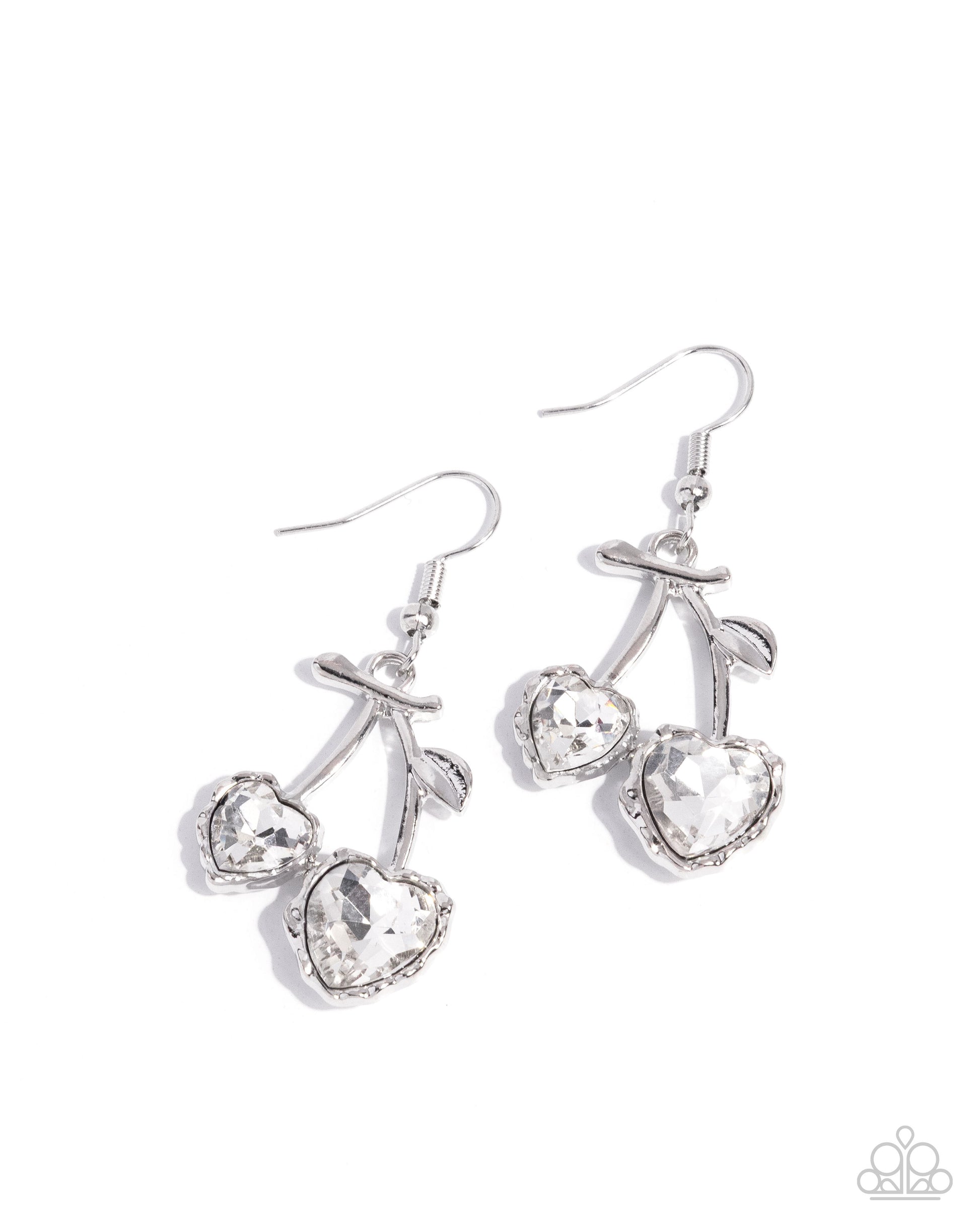 Silver earrings with heart-shaped gemstones on a white background