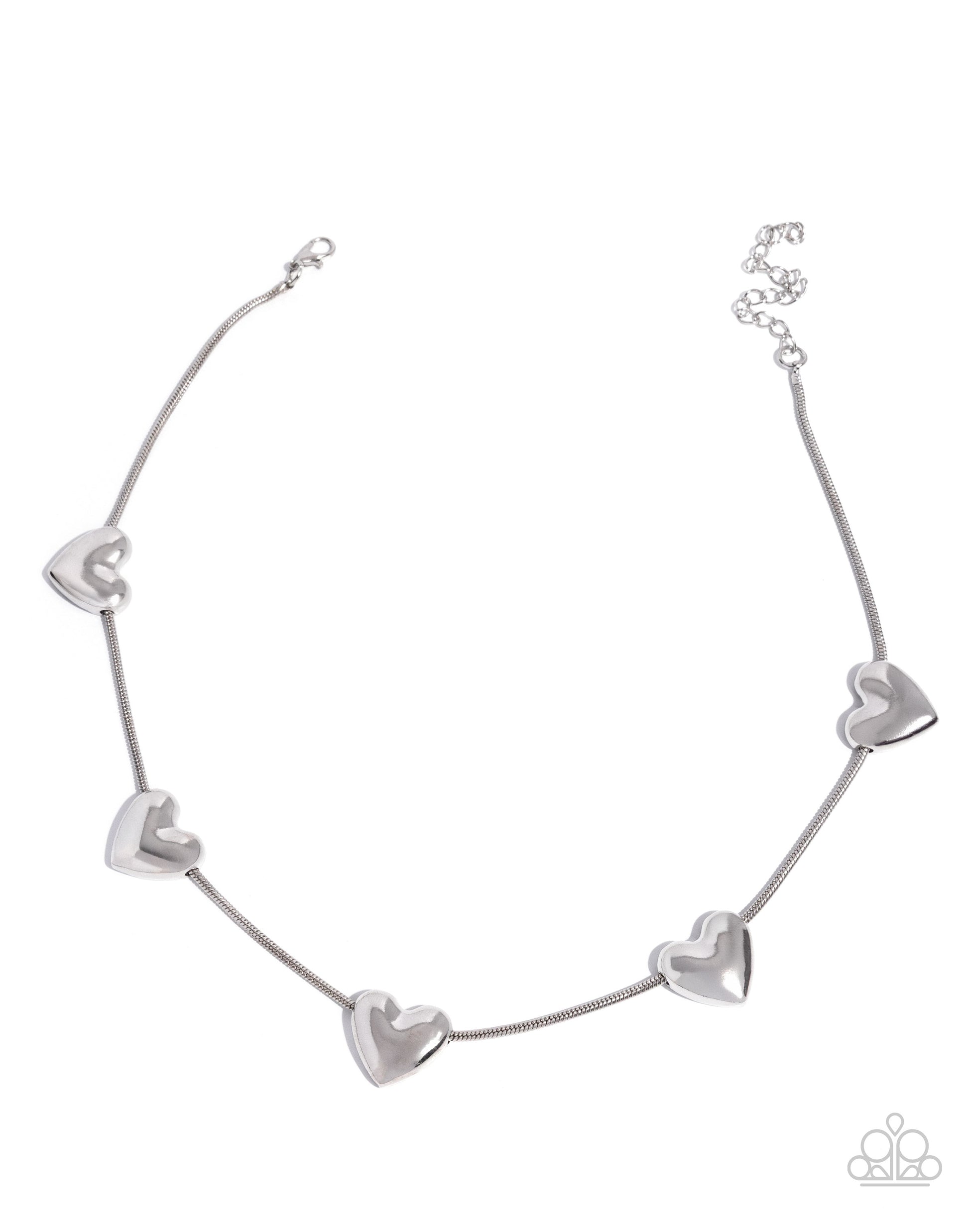 A silver chain necklace featuring five polished heart-shaped charms spaced along the chain, displayed on a clean white background.