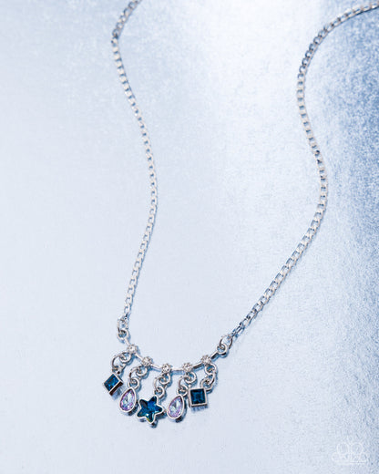 Necklace with star-shaped pendant on a light blue background