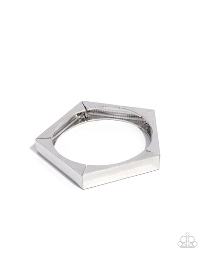 Silver geometric bracelet on a white background