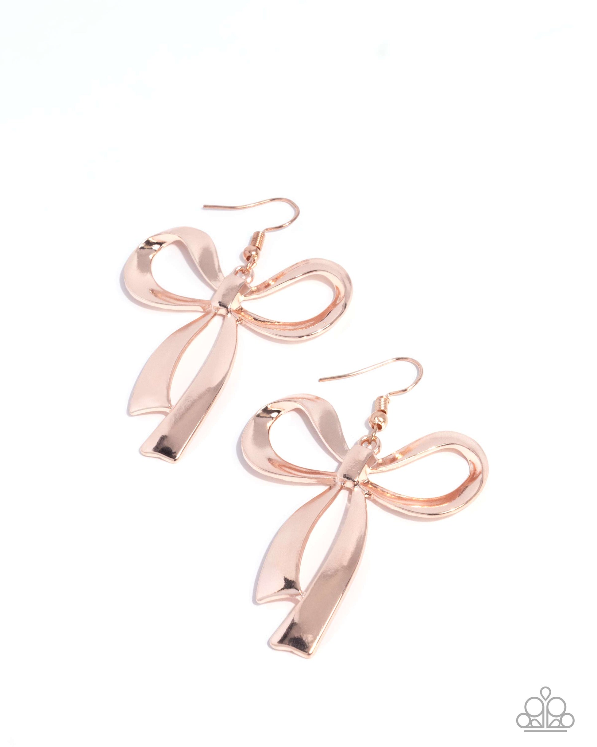 Rose gold bow-shaped earrings on a white background
