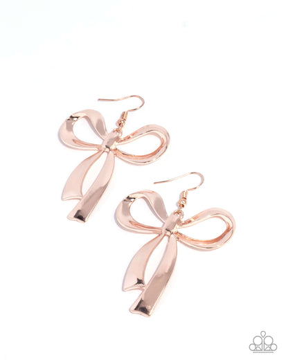 Rose gold bow-shaped earrings on a white background