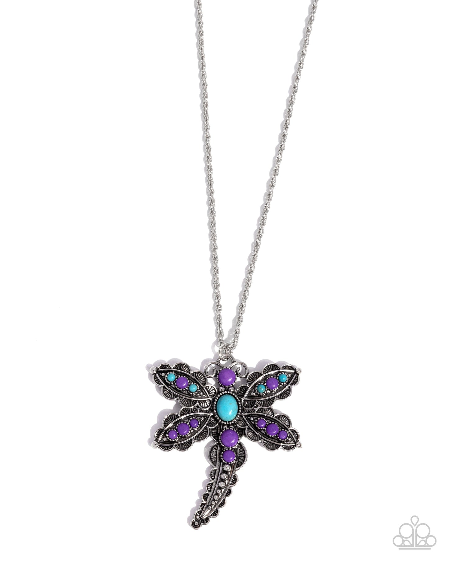 Dragonfly-shaped necklace with purple and blue gemstones on a white background