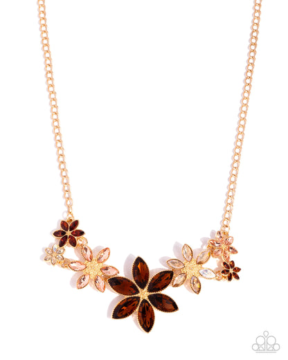Necklace with floral designs on a white background