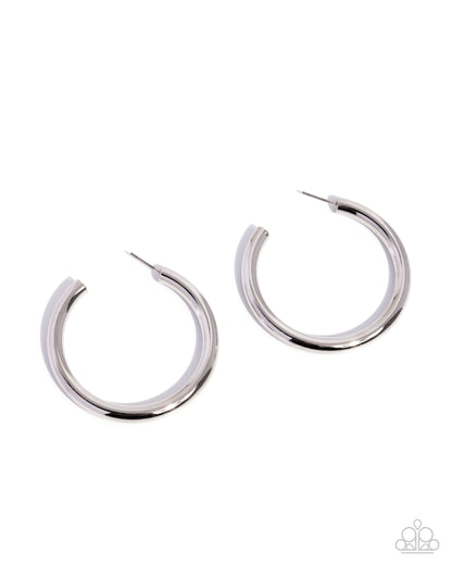 Pair of silver hoop earrings on a white background