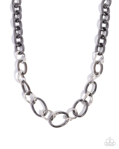 Silver chain necklace on a white background
