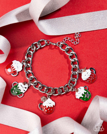 Silver chain bracelet with colorful charms on a red background with white ribbons