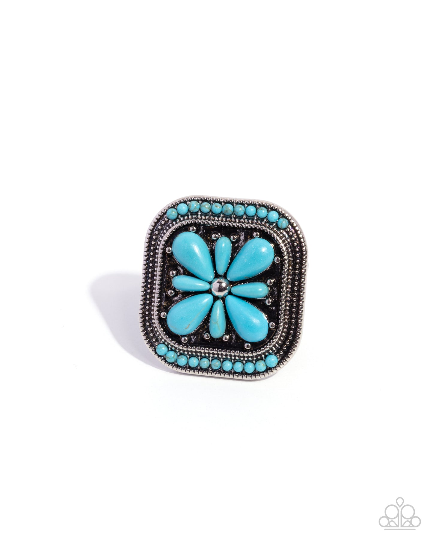 Turquoise flower ring with silver accents on a white background