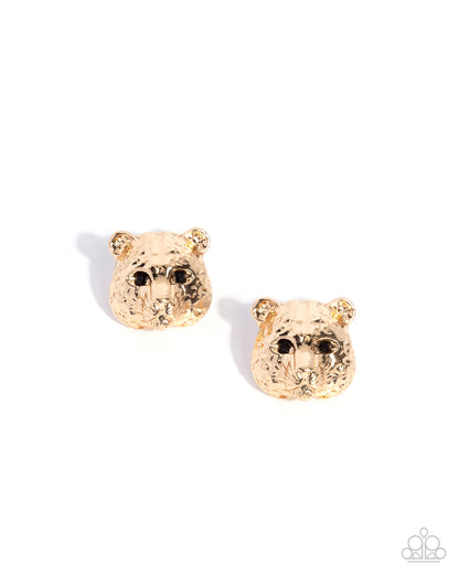 Gold bear head earrings on a white background