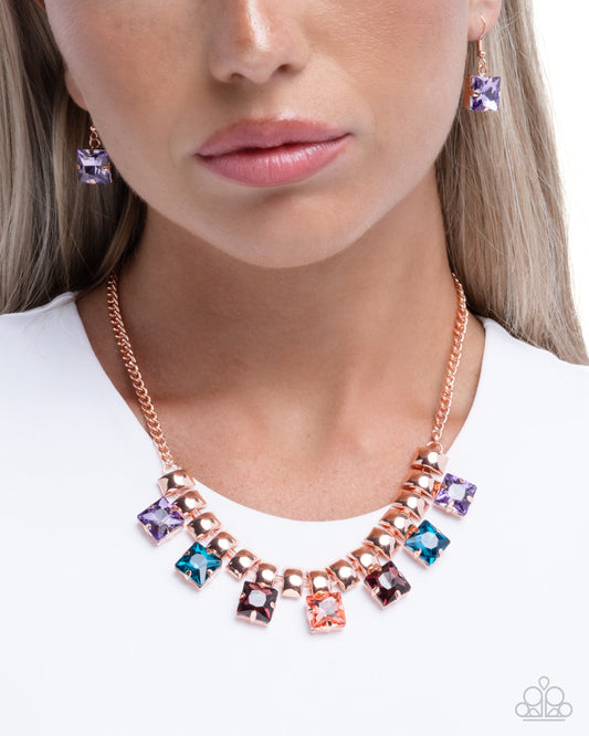 Necklace with colorful gemstones worn by a model on a white background
