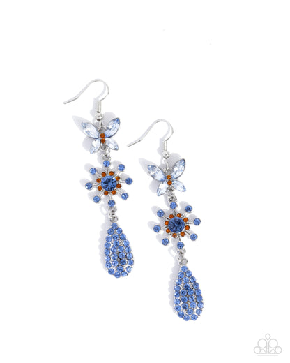 Pair of blue butterfly earrings on a white background