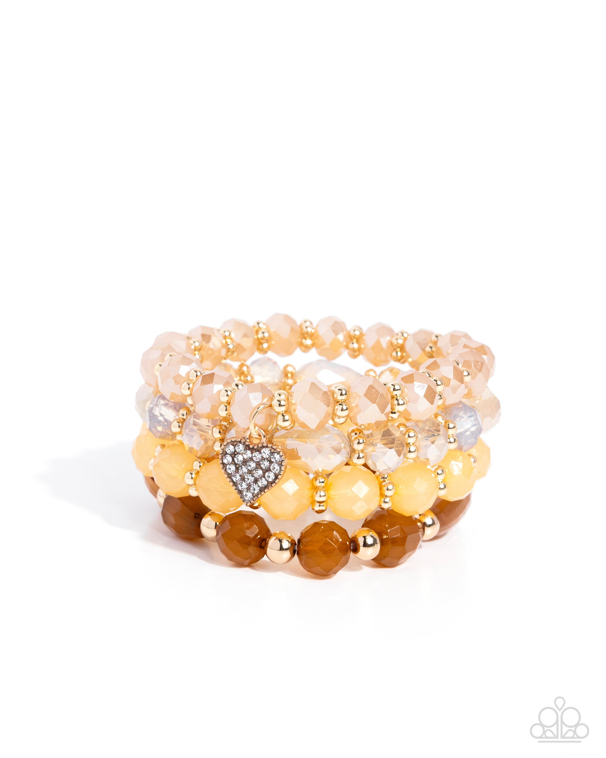 Stack of beaded bracelets with a heart charm on a white background