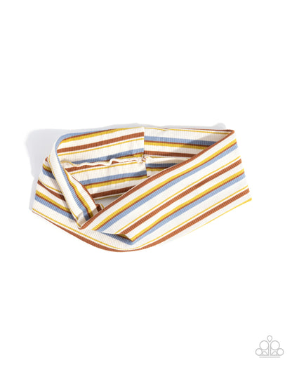 Striped fabric roll with multicolor pattern on a white background