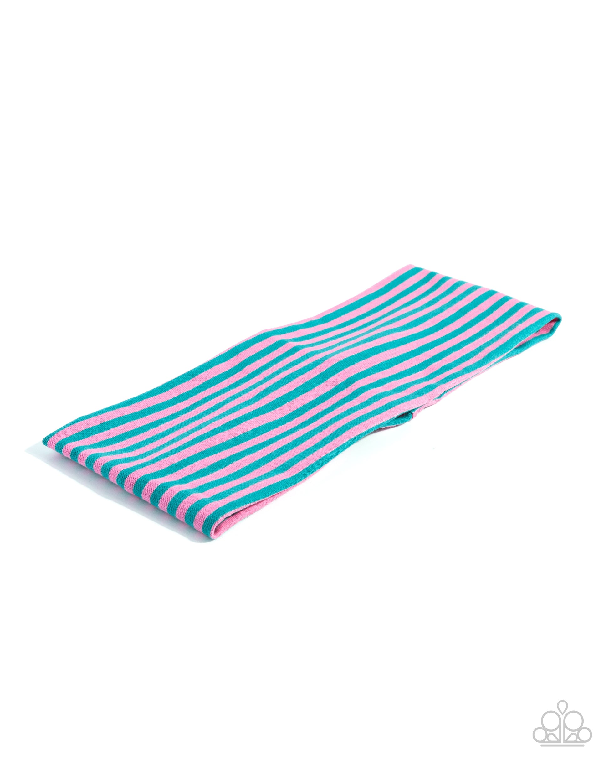 Turquoise and pink striped towel on a white background