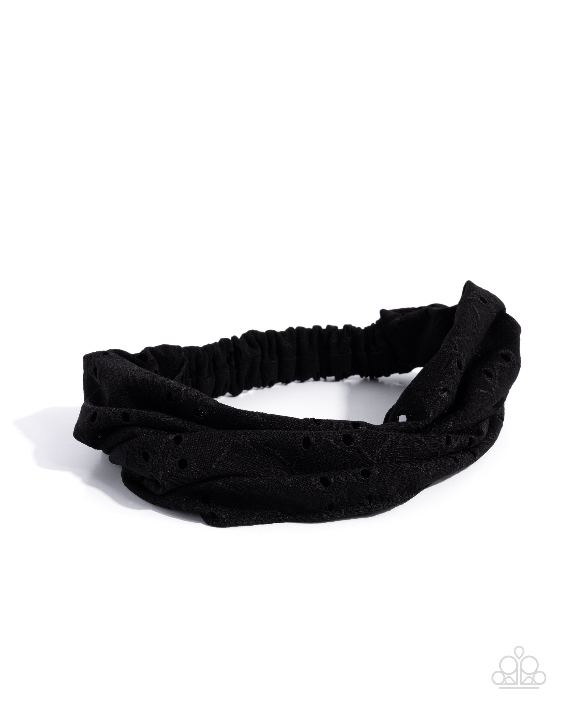 Black headband with textured pattern on a white background